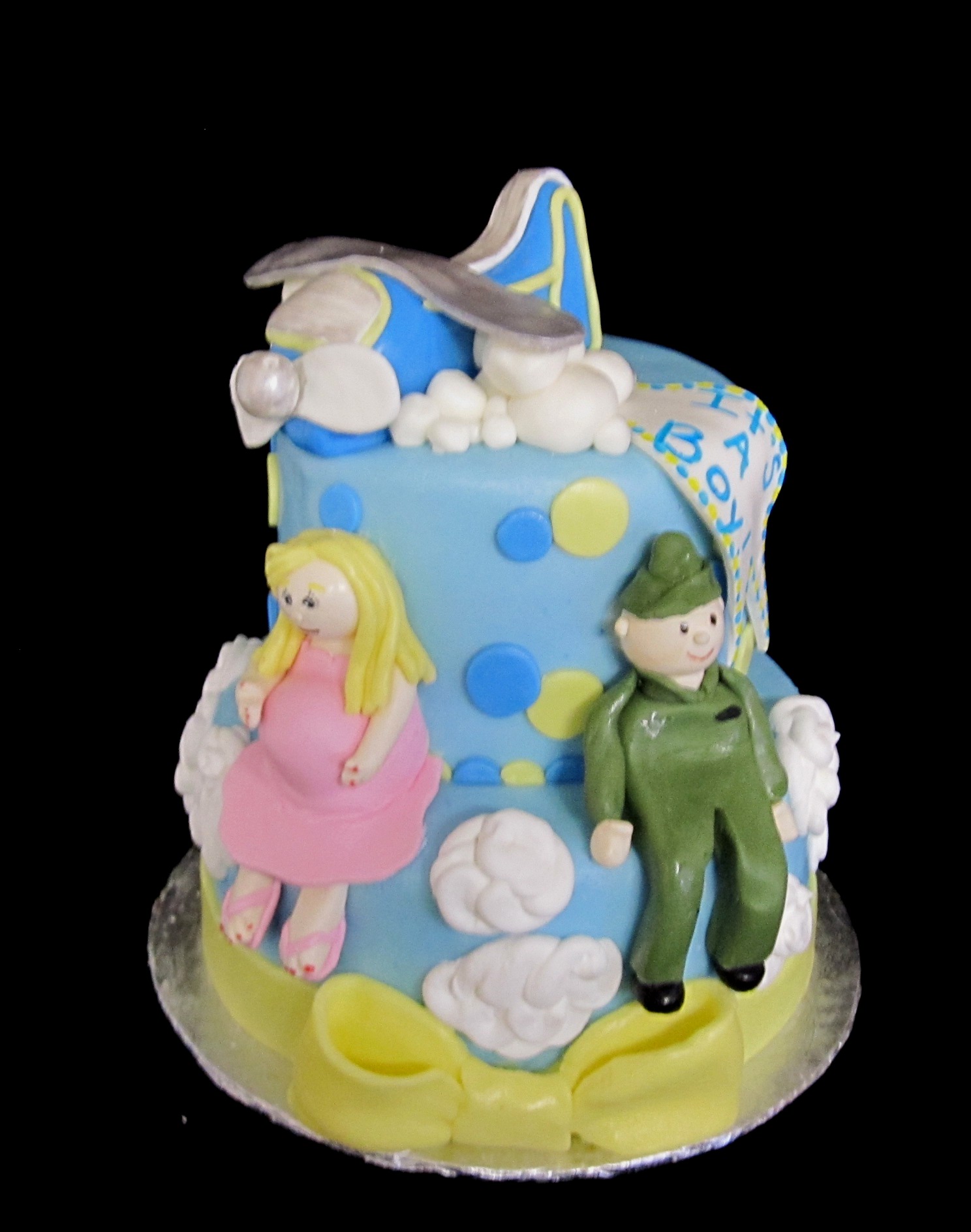 This cute baby boy baby shower cake is created in marshmallow fondant ...